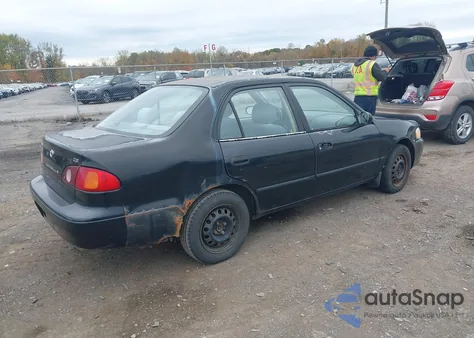 2002 Toyota Corolla Ce из США, поврежденный, VIN 2T1BR12E92C521983